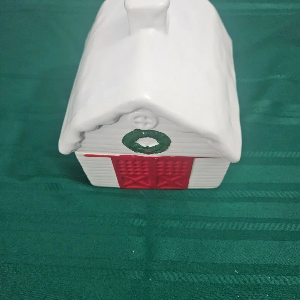 Cookie And Treat Jar In A Ceramic Barn with Red Doors And Green Wreath
